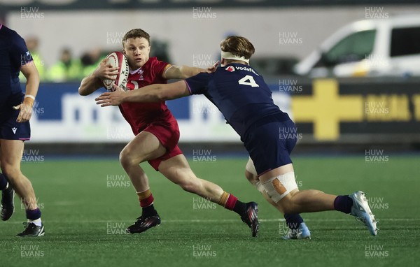 200226 - Wales U20 v Scotland U20, 2026 U20 Six Nations - Tom Bowen of Wales takes on Christian Lindsay of Scotland’