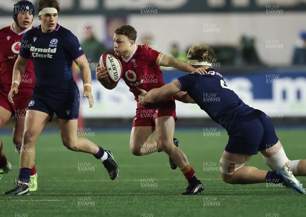 200226 - Wales U20 v Scotland U20, 2026 U20 Six Nations - Tom Bowen of Wales takes on Christian Lindsay of Scotland’