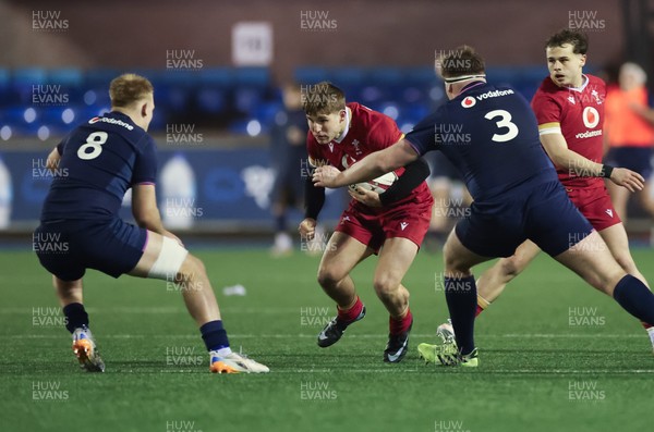 200226 - Wales U20 v Scotland U20, 2026 U20 Six Nations - Steff Emanuel of Wales takes on Ollie Blyth-Lafferty of Scotland and Rory Purvis of Scotland