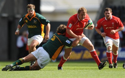22.06.08 - Wales Under 20 v South Africa Under 20 - IRB Junior World Championship 2008 - 3rd Place Play-Off - Wales' Scott Andrews is tackled by South Africa's Wiehahn Herbst. 