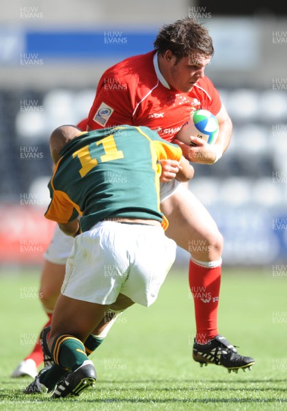 22.06.08 - Wales Under 20 v South Africa Under 20 - IRB Junior World Championship 2008 - 3rd Place Play-Off - Wales' Ryan Bevington is tackled by South Africa's Lionel Mapoe. 