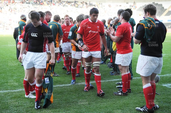 22.06.08 - Wales Under 20 v South Africa Under 20 - IRB Junior World Championship 2008 - 3rd Place Play-Off - Wales players look dejected as they leave the field. 