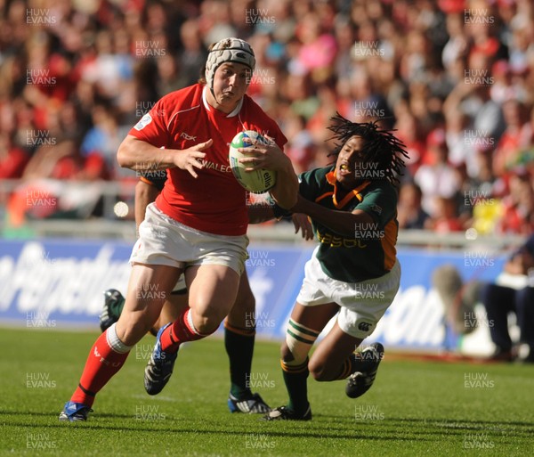 22.06.08 - Junior World Championship 2008 3rd Place Play Off - Wales v South Africa Wales' Jonathan Davies tries gets past South Africa's Cecil Afrika 