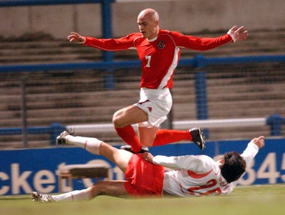 110203 - Wales U20 v South Korea U20 - Wales' David Pipe escapes tackle from Beom Seok Oh