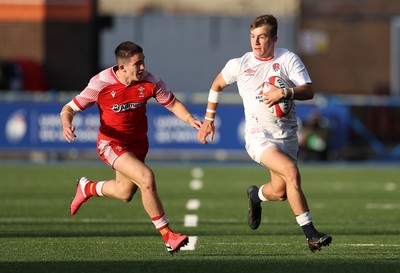 070721 - Wales U20s v England U20s - U20s 6 Nations Championship - Arthur Relton of England breaks from Daniel John of Wales