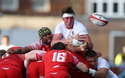 070721 - Wales U20s v England U20s - U20s 6 Nations Championship - Christ Tshiunza of Wales and Alex Groves of England go for the ball