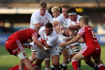 070721 - Wales U20s v England U20s - U20s 6 Nations Championship - Harvey Kindell-Beaton of England is tackled by Rhys Thomas of Wales