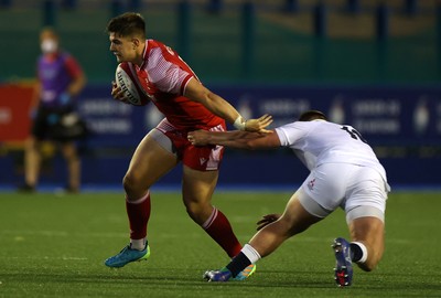 070721 - Wales U20s v England U20s - U20s 6 Nations Championship - Joe Hawkins of Wales is tackled by Luke Green of England