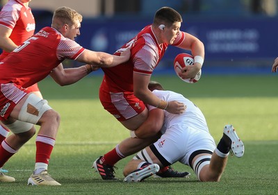 070721 - Wales U20 v England U20, 2021 Six Nations U20 Championship - Oli Burrows of Wales is tackled