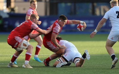 070721 - Wales U20 v England U20, 2021 Six Nations U20 Championship - Oli Burrows of Wales is tackled