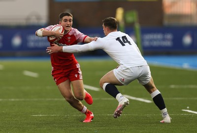 070721 - Wales U20 v England U20, 2021 Six Nations U20 Championship - Daniel John of Wales takes on Tom Roebuck of England