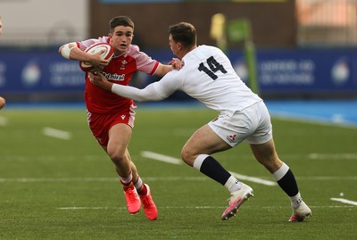 070721 - Wales U20 v England U20, 2021 Six Nations U20 Championship - Daniel John of Wales takes on Tom Roebuck of England