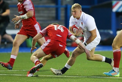 070721 - Wales U20 v England U20, 2021 Six Nations U20 Championship - Archie Vanes of England takes on Daniel John of Wales