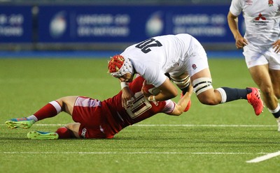 070721 - Wales U20 v England U20, 2021 Six Nations U20 Championship - Josh Gray of England is tackled by Sam Costelow of Wales