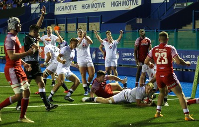 070721 - Wales U20 v England U20, 2021 Six Nations U20 Championship - England players celebrate after Nahum Merigan of England powers over for a try in the final minute of the match