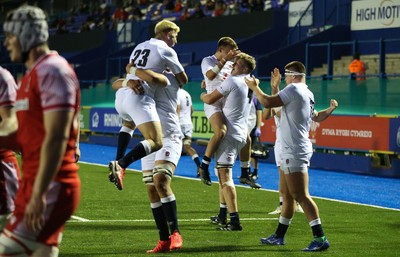 070721 - Wales U20 v England U20, 2021 Six Nations U20 Championship - England players celebrate after Nahum Merigan of England powers over for a try in the final minute of the match