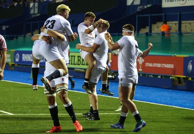 070721 - Wales U20 v England U20, 2021 Six Nations U20 Championship - England players celebrate after Nahum Merigan of England powers over for a try in the final minute of the match