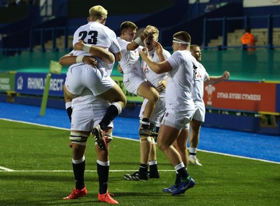 070721 - Wales U20 v England U20, 2021 Six Nations U20 Championship - England players celebrate after Nahum Merigan of England powers over for a try in the final minute of the match