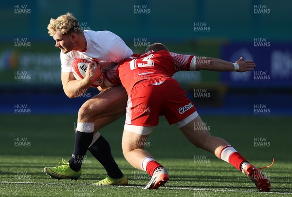070721 - Wales U20s v England U20s - U20s 6 Nations Championship - Jack Bates of England is tackled by Ioan Evans of Wales