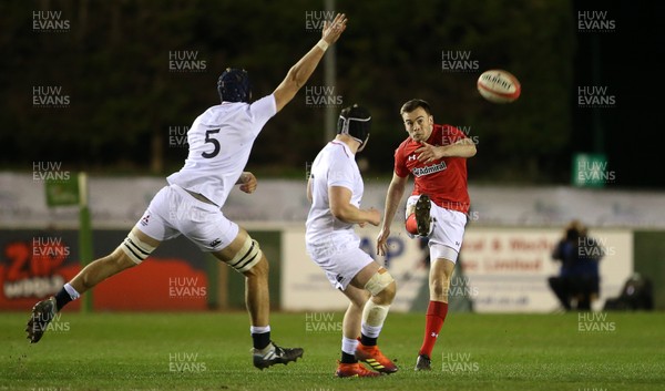 220219 - Wales U20s v England U20s - U20s 6 Nations Championship - Cai Evans of Wales kicks the ball