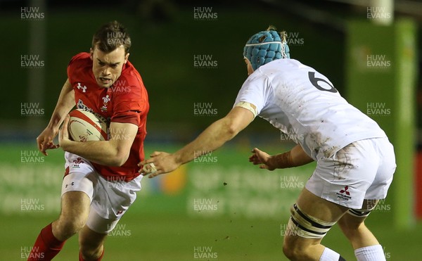 220219 - Wales U20s v England U20s - U20s 6 Nations Championship - Cai Evans of Wales is tackled by Richard Capstick of England