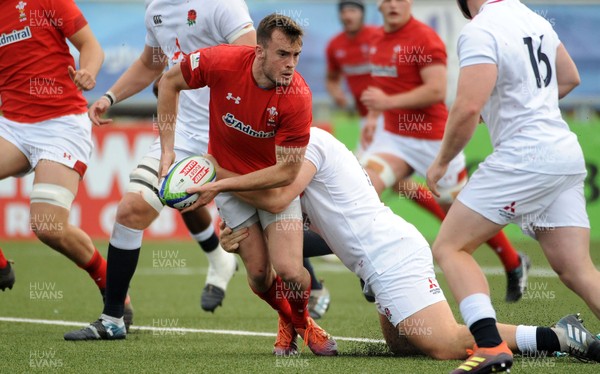 220619 - Wales U20 v England U20 - World Rugby Under 20 Championship - 5th Place Final - Cai Evans of Wales makes a break