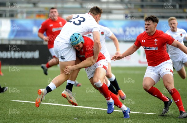 220619 - Wales U20 v England U20 - World Rugby Under 20 Championship - 5th Place Final - Ryan Conbeer of Wales puts in a thunderous tackle on England�s Tom Seabrook