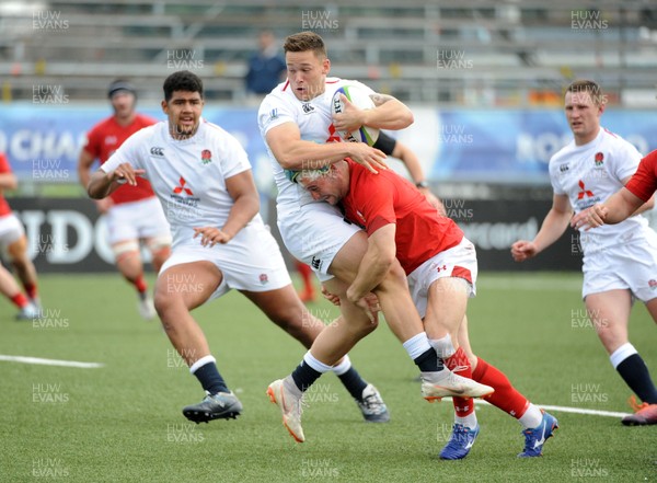 220619 - Wales U20 v England U20 - World Rugby Under 20 Championship - 5th Place Final - Ryan Conbeer of Wales puts in a thunderous tackle on England�s Tom Seabrook