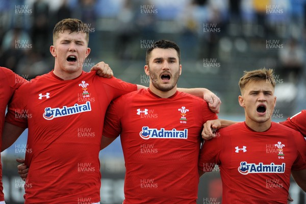220619 - Wales U20 v England U20 - World Rugby Under 20 Championship - 5th Place Final -  (L to R) Jac Price, Iestyn Rees and Harri Morgan sing the national anthem