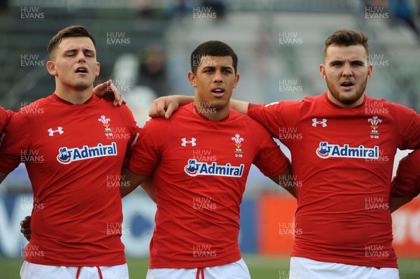 220619 - Wales U20 v England U20 - World Rugby Under 20 Championship - 5th Place Final -  (L to R) Lennon Greggains, Rio Dyer and  Garin Lloyd players sing the national anthem