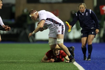 140325 - Wales U20s v England U20s - U20s Six Nations Championship - George Timmins of England is tackled by Harry Rees-Weldon of Wales 