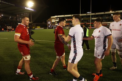 140325 - Wales U20s v England U20s - U20s Six Nations Championship - Wales players shake hands at full time