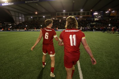 140325 - Wales U20s v England U20s - U20s Six Nations Championship - Deian Gwynne and Aidan Boshoff of Wales at full time