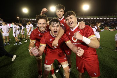 140325 - Wales U20s v England U20s - U20s Six Nations Championship - Deian Gwynne, Elis Price, Dan Gemine and Evan Wood of Wales celebrates at full time