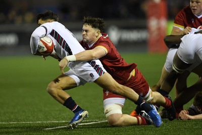 140325 - Wales U20 v England U20 - Six Nations Chamionship - Dan Gemine of Wales U20s is challenged by Dom Hanson of England U20s