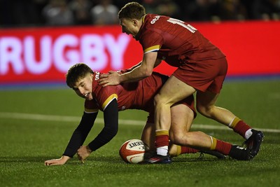 140325 - Wales U20 v England U20 - Six Nations Chamionship - Steffan Emanuel of Wales U20s celebrates scoring a try with team mates