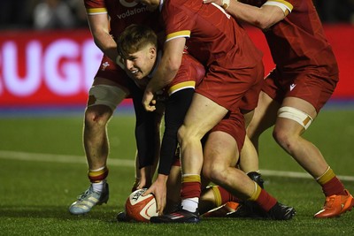 140325 - Wales U20 v England U20 - Six Nations Chamionship - Steffan Emanuel of Wales U20s celebrates scoring a try with team mates