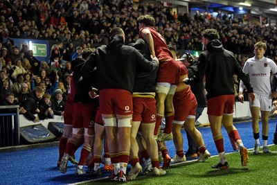 140325 - Wales U20 v England U20 - Six Nations Chamionship - Harry Rees-Weldon of Wales U20s celebrates scoring a try with team mates