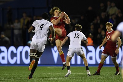 140325 - Wales U20 v England U20 - Six Nations Chamionship - Aidan Boshoff of Wales U20s is challenged by Nic Allison of England U20s