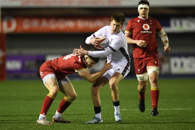 140325 - Wales U20 v England U20 - Six Nations Chamionship - Harry Rees-Weldon of Wales U20s is challenged by Jack Kinder of England U20s