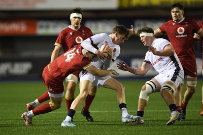 140325 - Wales U20 v England U20 - Six Nations Chamionship - Harry Rees-Weldon of Wales U20s is challenged by Jack Kinder of England U20s