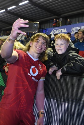 140325 - Wales U20 v England U20 - Six Nations Chamionship - Aidan Boshoff of Wales U20s with fans at full time