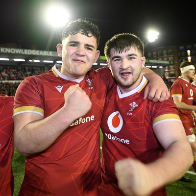 140325 - Wales U20 v England U20 - Six Nations Chamionship - Sam Scott and Harry Thomas of Wales U20s celebrates the win at full time