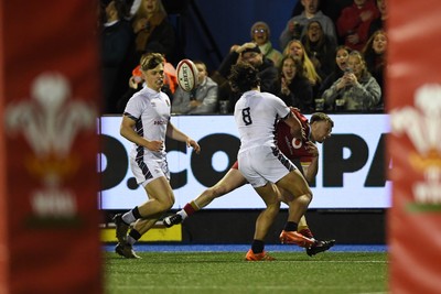 140325 - Wales U20 v England U20 - Six Nations Chamionship - Tom Bowen of Wales U20s is challenged by Kane James of England U20s