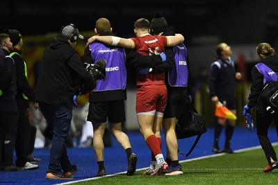 140325 - Wales U20 v England U20 - Six Nations Chamionship - Harry Rees-Weldon of Wales U20s leaves the field injured