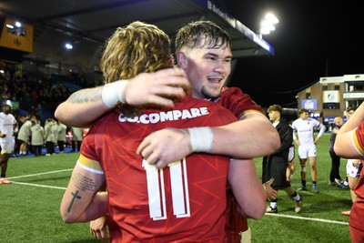 140325 - Wales U20 v England U20 - Six Nations Chamionship - Aidan Boshoff and Harry Thomas of Wales U20s celebrate the win at full time