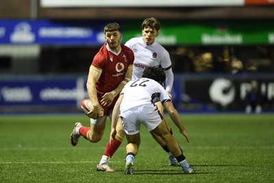 140325 - Wales U20 v England U20 - Six Nations Chamionship - Harry Rees-Weldon of Wales U20s is challenged by Josh Bellamy of England U20s