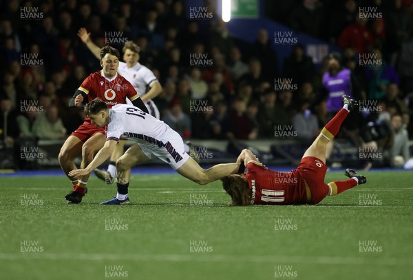 140325 - Wales U20s v England U20s - U20s Six Nations Championship - Angus Hall of England is tackled by Aidan Boshoff of Wales 