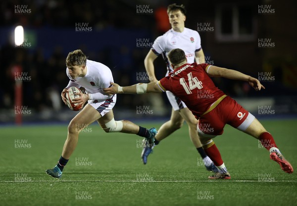 140325 - Wales U20s v England U20s - U20s Six Nations Championship - George Pearson of England is tackled by Harry Rees-Weldon of Wales 