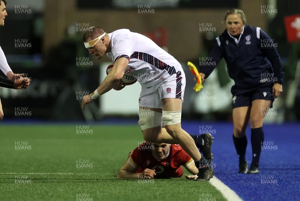 140325 - Wales U20s v England U20s - U20s Six Nations Championship - George Timmins of England is tackled by Harry Rees-Weldon of Wales 